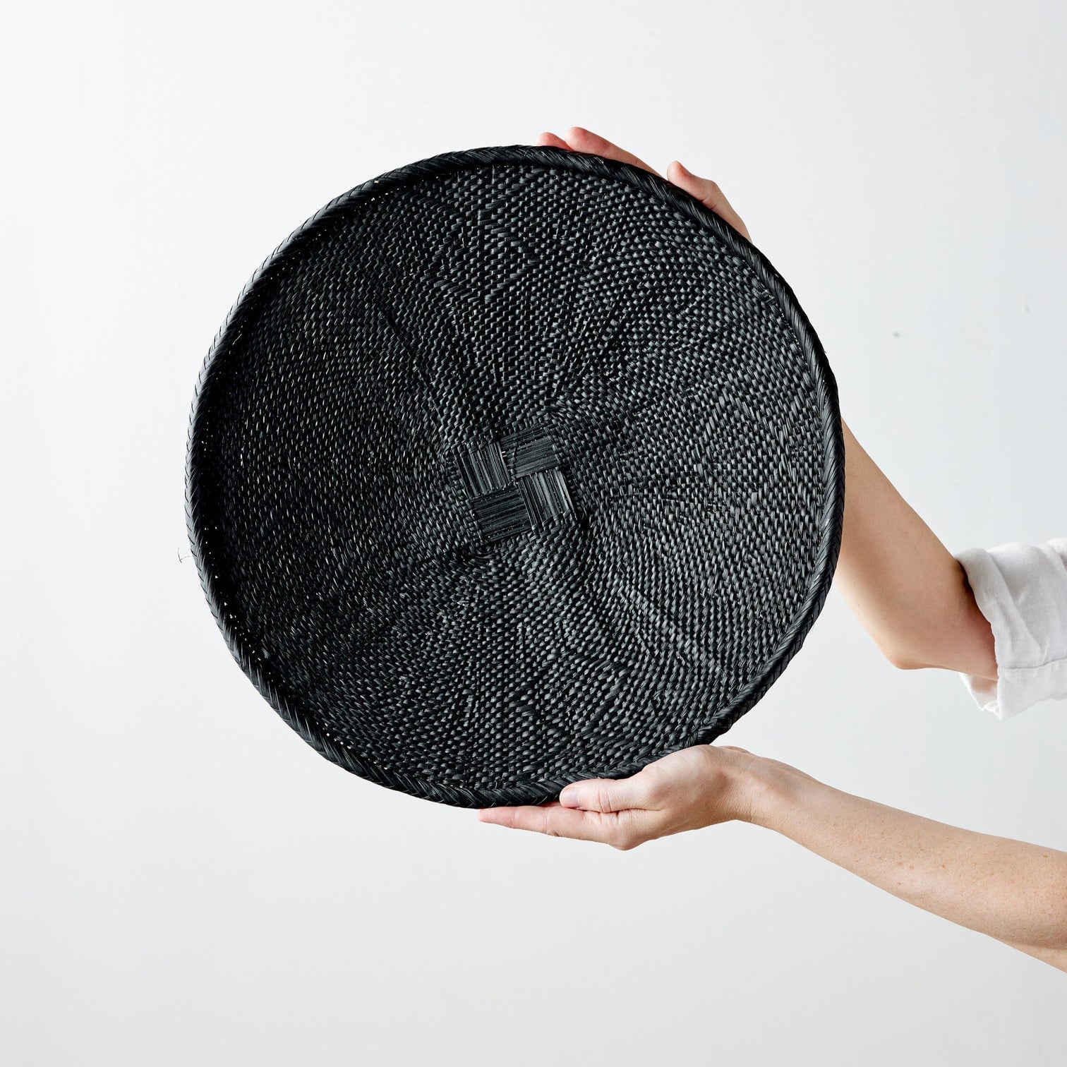Hand painted black binga flat basket - organic fiber wall art